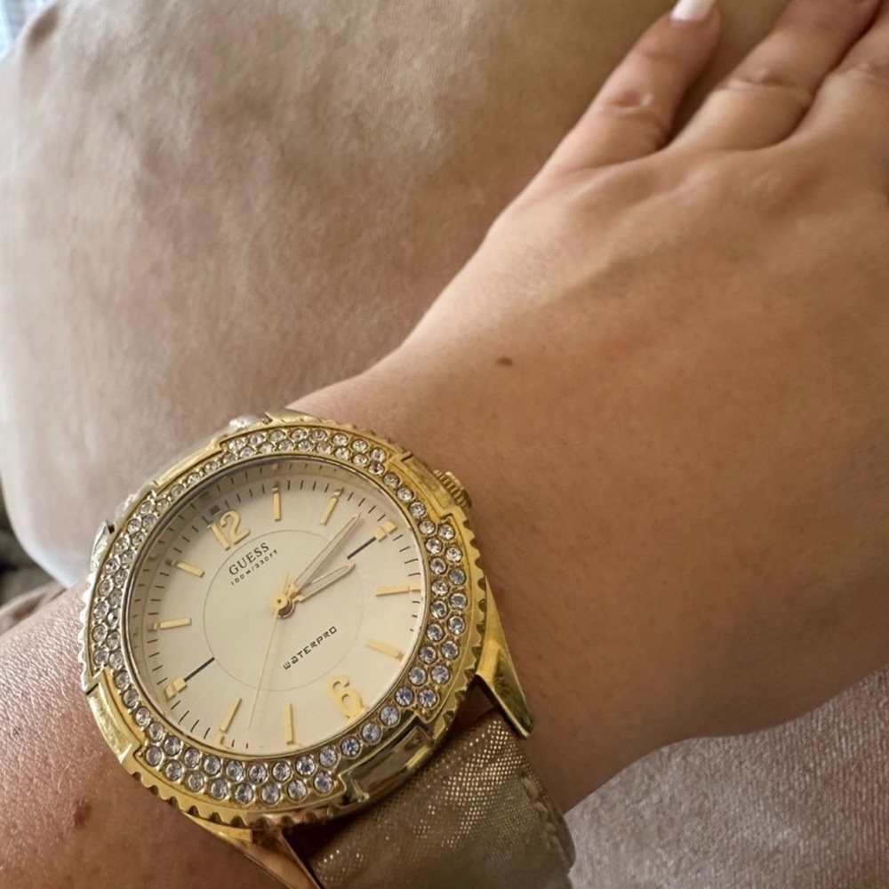 Elegant Gold and Silver Watch with Crystal Accents
